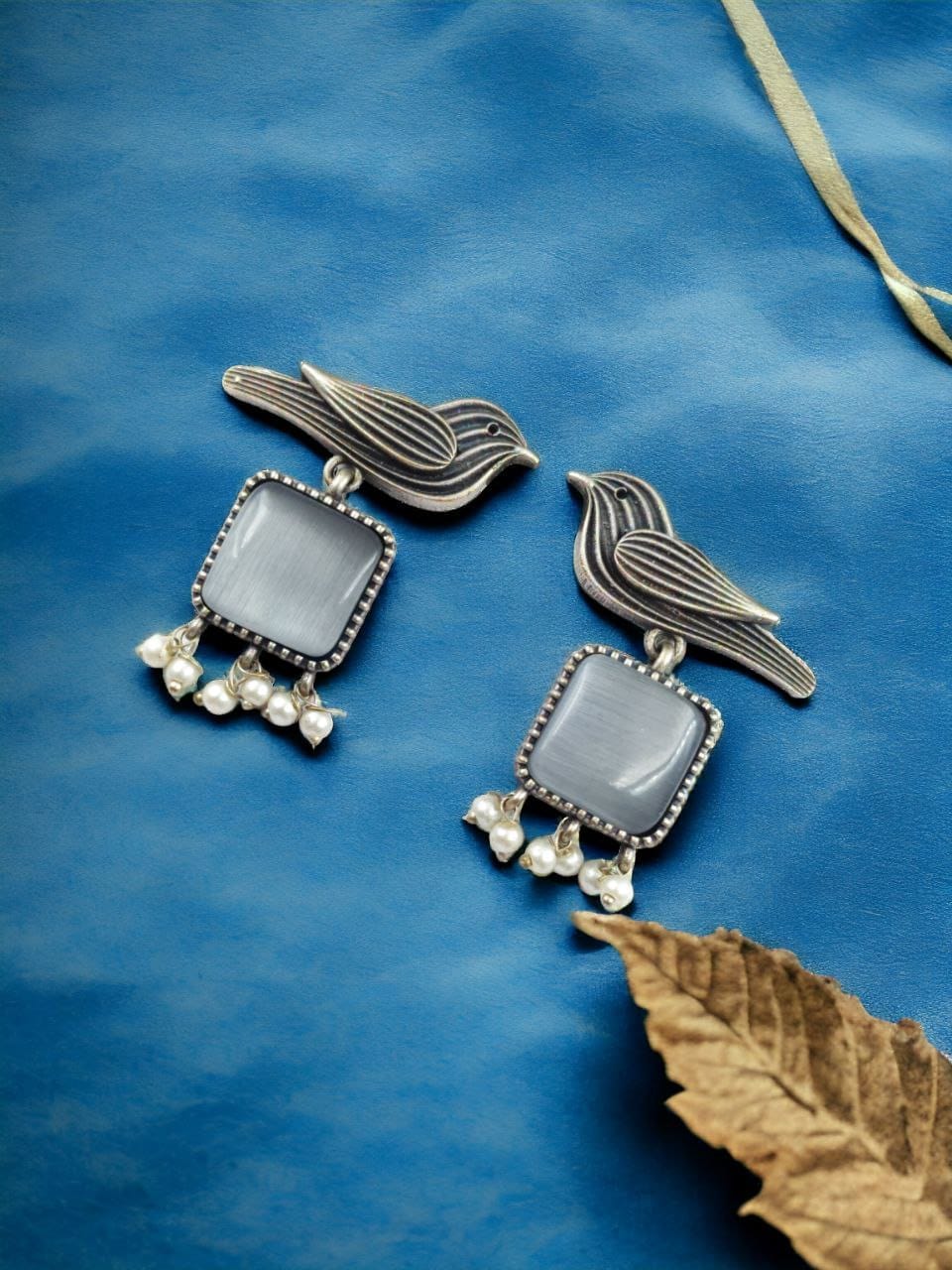 Maabetii White Stylish Stone with Oxidised Dangler Stud