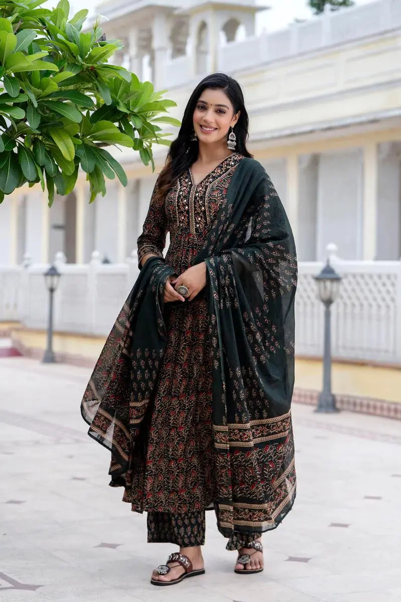 Woman in printed cotton kurta set with dupatta and sequence work