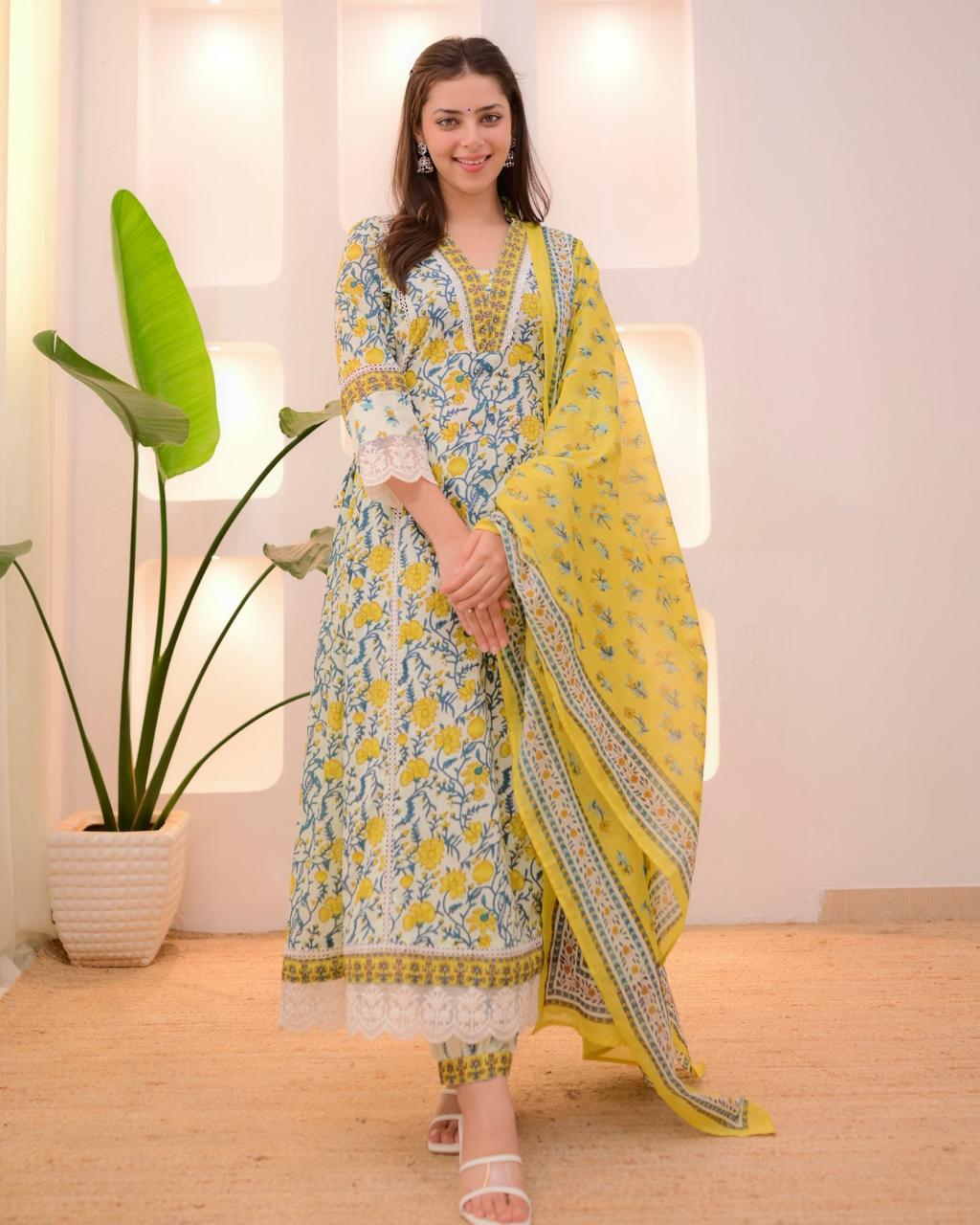 Yellow cotton Afghani suit with floral schiffli work