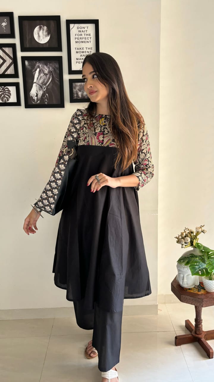 Elegant printed black kurta with matching palazzo, perfect for casual and festive wear.