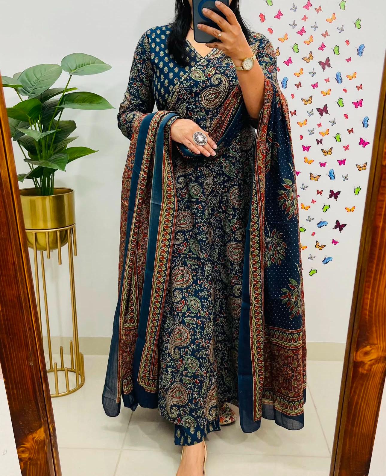 Blue cotton angrakha anarkali suit with intricate prints, styled on a model.