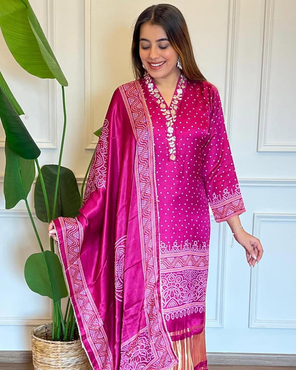 Pink Chinon straight-fit suit set with zari embroidery, matching pants, and a dupatta, perfect for festive and wedding occasions.
