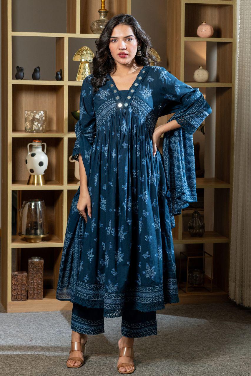 Blue floral printed cotton Anarkali suit set with matching pants and a dupatta, perfect for festive and casual occasions.