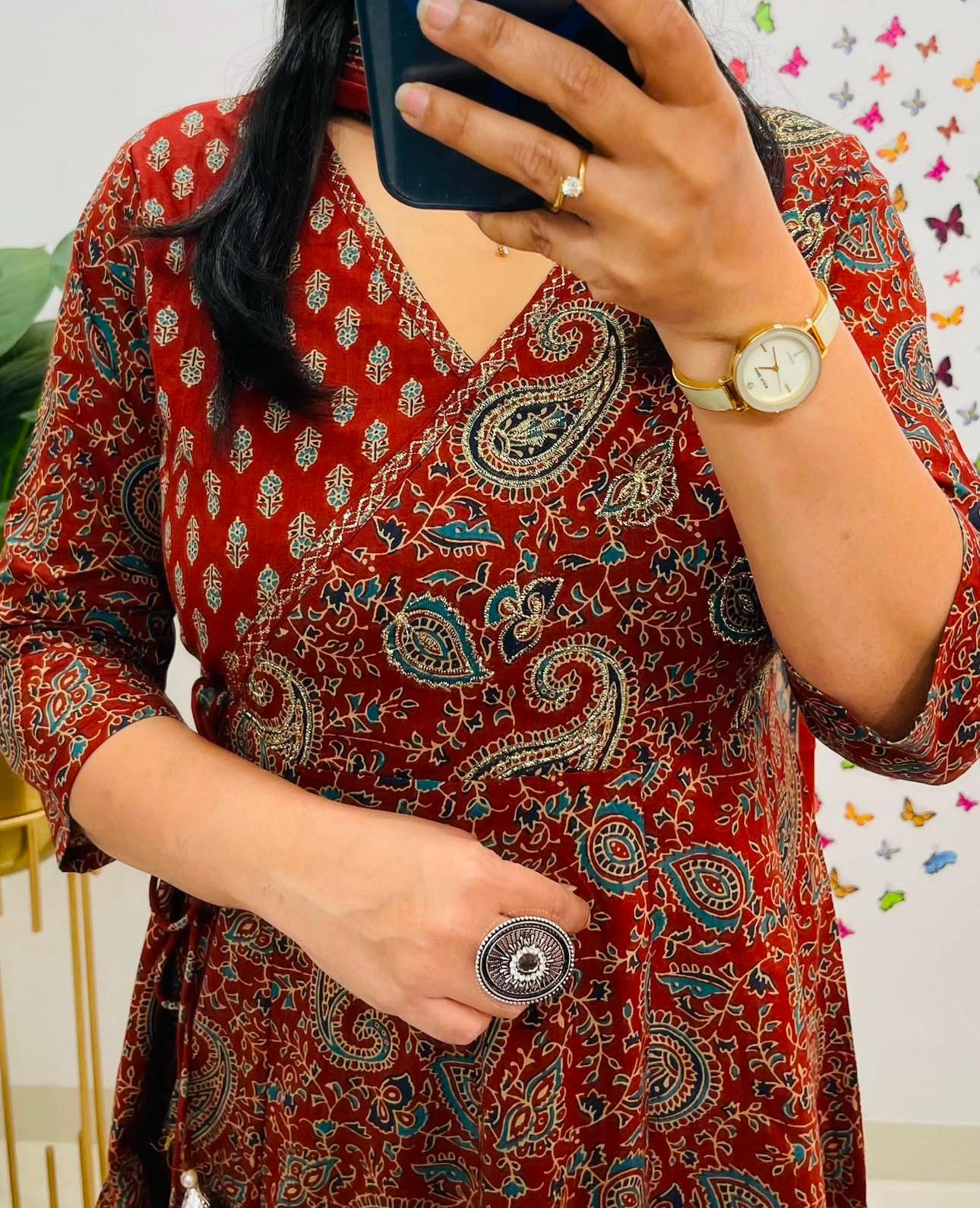 Close-up of the angrakha neckline and tie-up design.