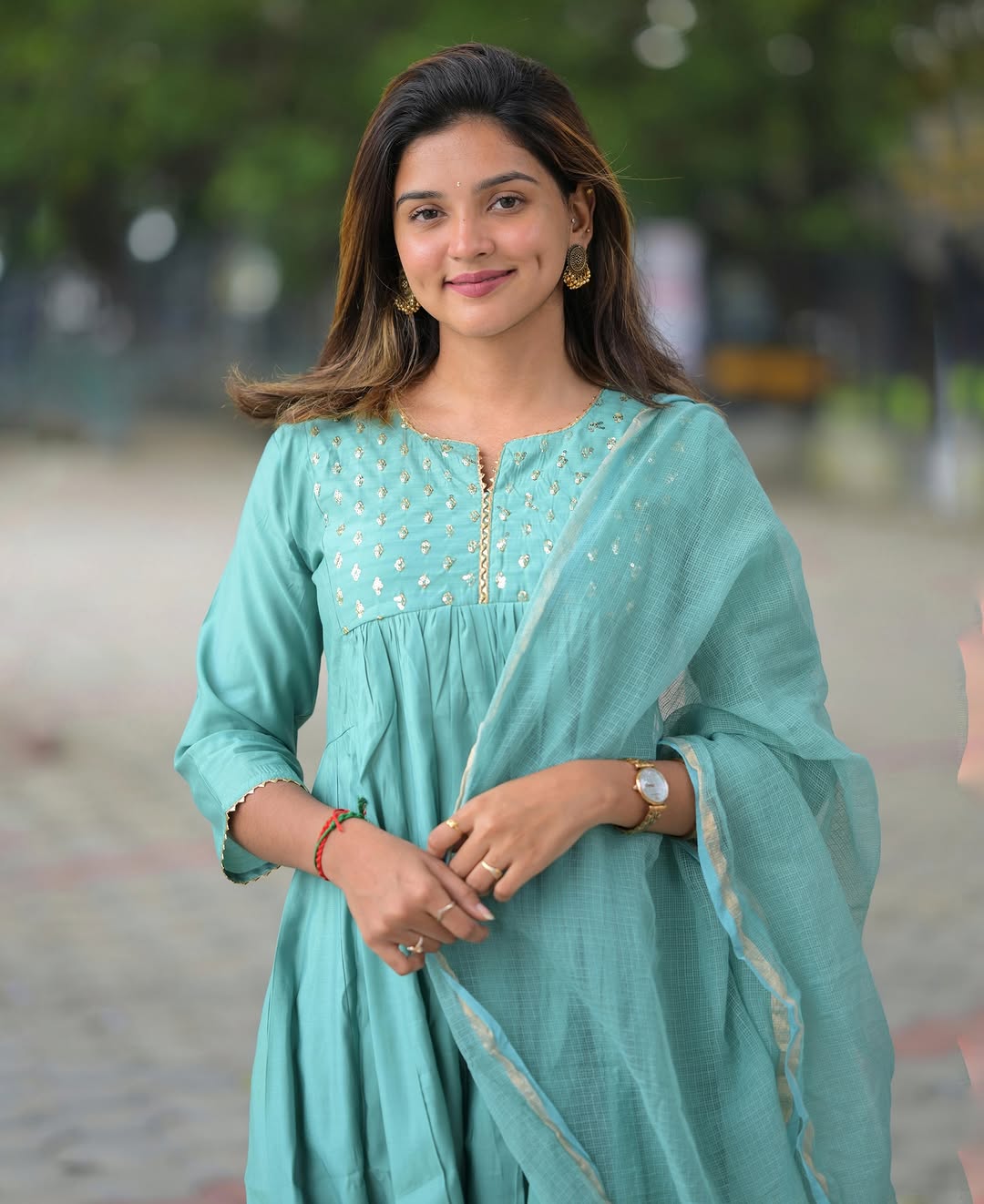 Elegant sky blue Alia cut kurti with intricate moti handwork, crafted from soft cotton for comfort and style.