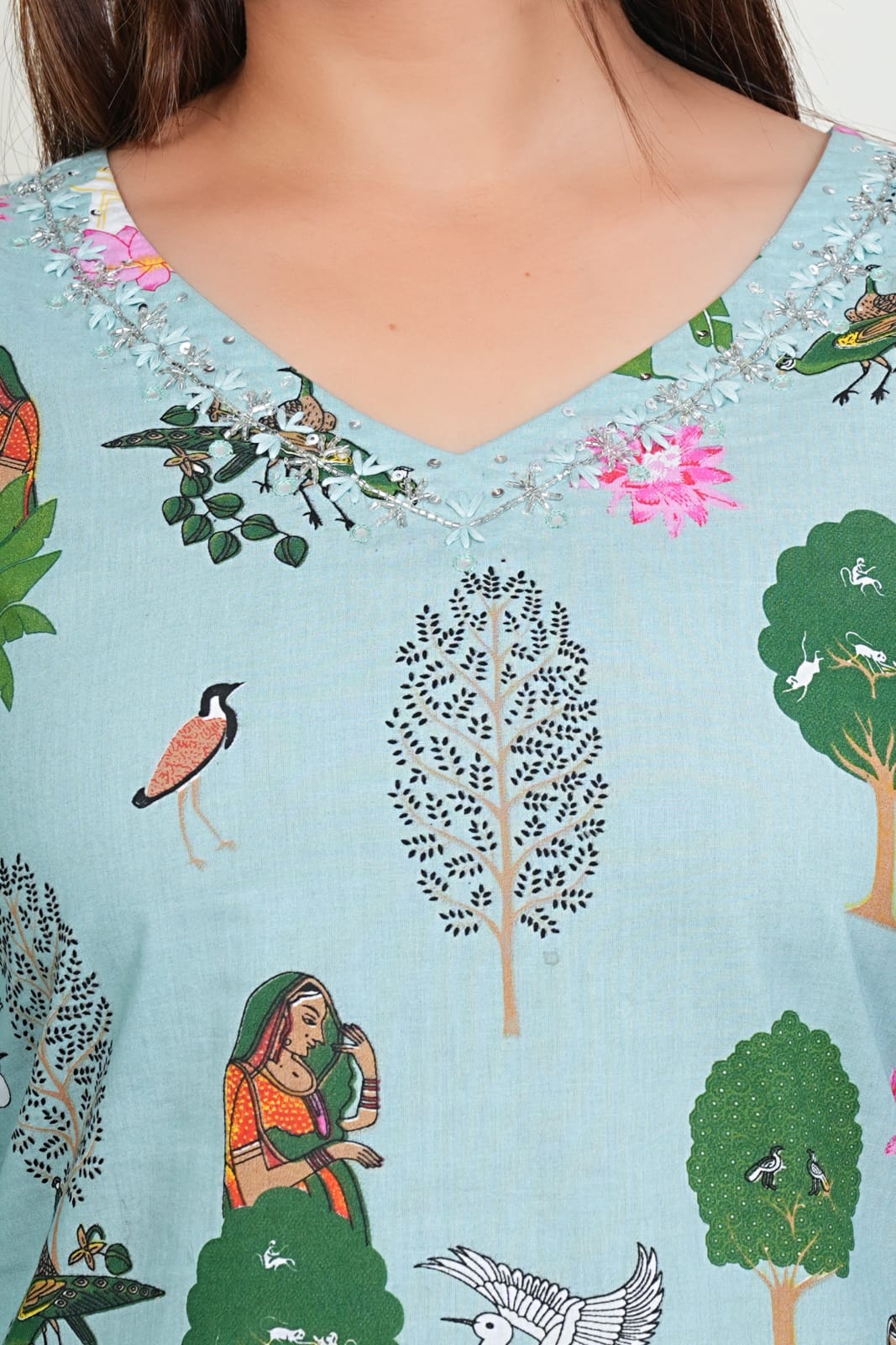 Elegant printed turquoise kurti with comfortable cotton pants, perfect for everyday wear.