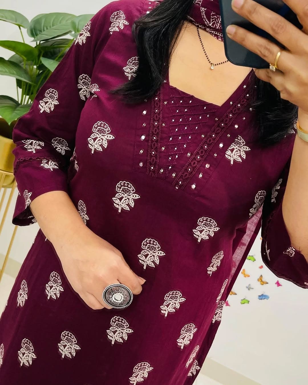 Elegant wine cotton straight-fit suit set featuring a stylish print, paired with comfortable pants and a lightweight dupatta.