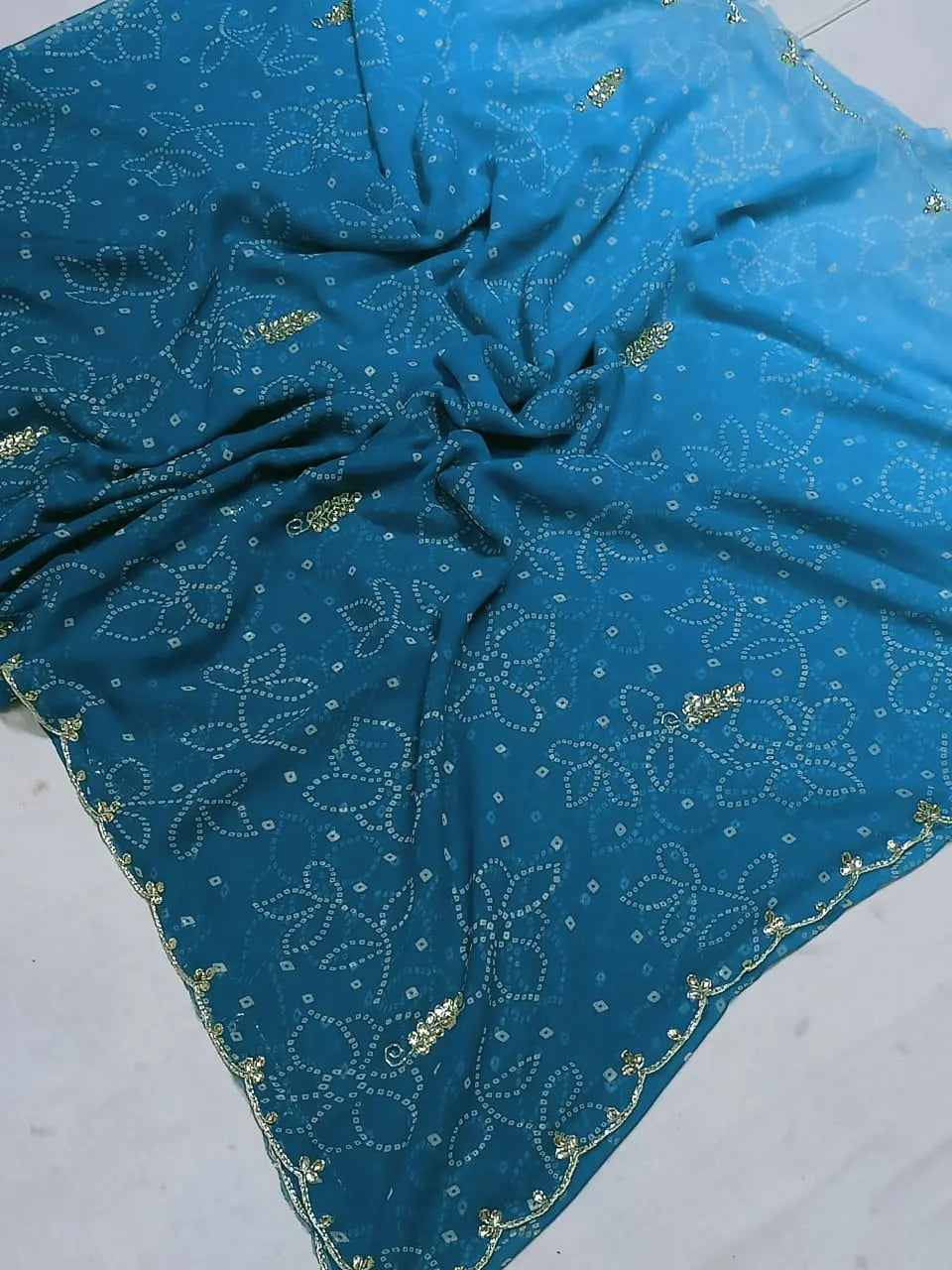 Close-up of zaal embroidery and cutwork on saree