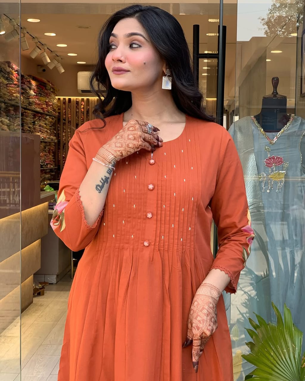 Model wearing printed cotton kurti set with dupatta – side pose