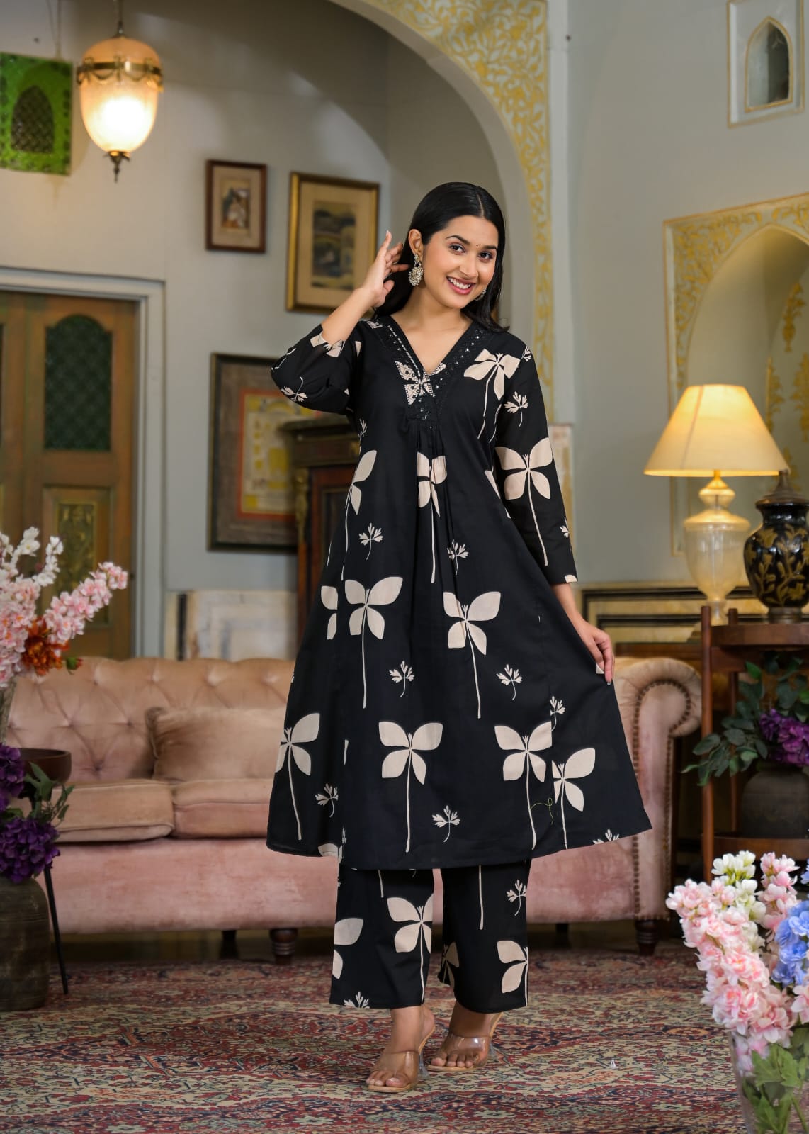 Full printed kurti and pant set laid flat

