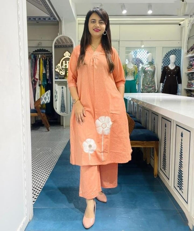 Front view of Aari embroidery cotton coord set in pink

