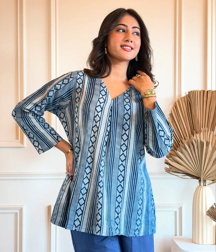 Close-up of cotton fabric print and neckline design

