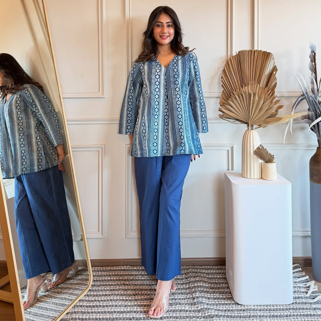 Front view of printed cotton top and plazo set in breathable fabric

