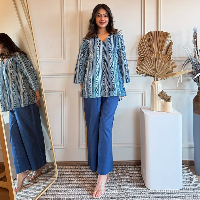 Front view of printed cotton top and plazo set in breathable fabric

