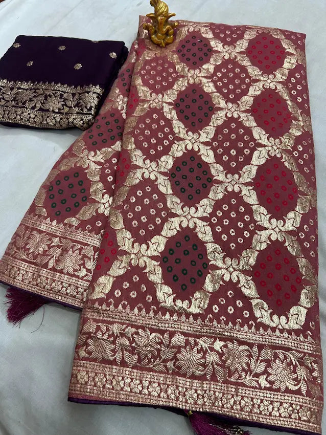 Close-up of intricate mina zari weaving on dola silk fabric