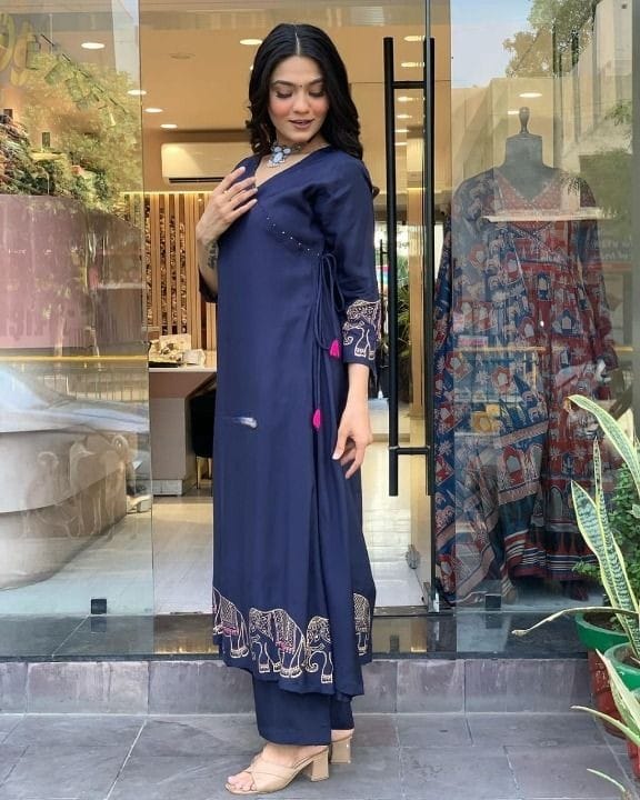 Model sitting in Aarohi cotton kurti set showing elegant workwear look

