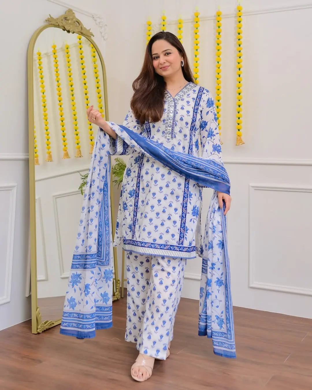 Short festive cotton kurta set with floral embroidery and lacework