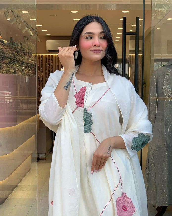 Close-up of heavy embroidery on festive cotton kurti

