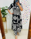Floral fine cotton A-line kurti pant set in peach color

