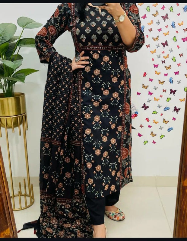 Model wearing ethnic hand work kurti in vibrant color

