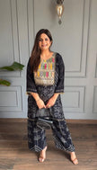 Heavy chinon co-ord set with original mirror work festive wear