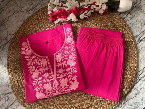 Embroidery detail on neckline and sleeves

