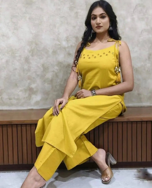 Yellow sleeveless cotton coord set with mirror work and latkans

