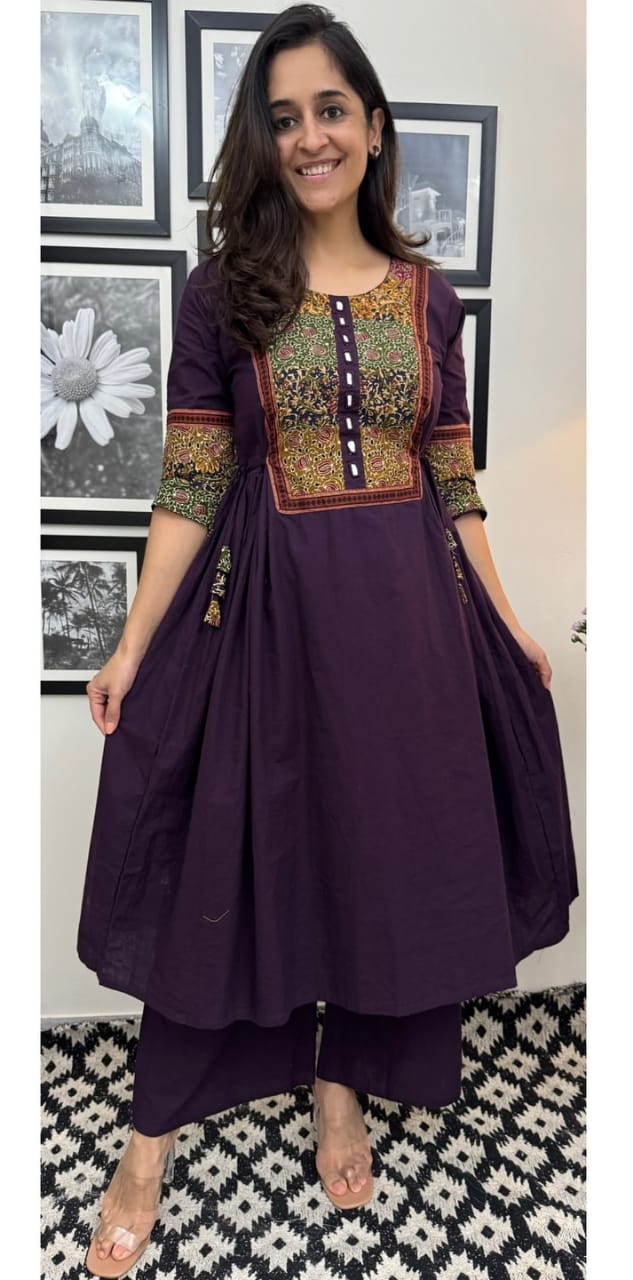 Festive cotton kurta set with tassels and mirror embroidery work