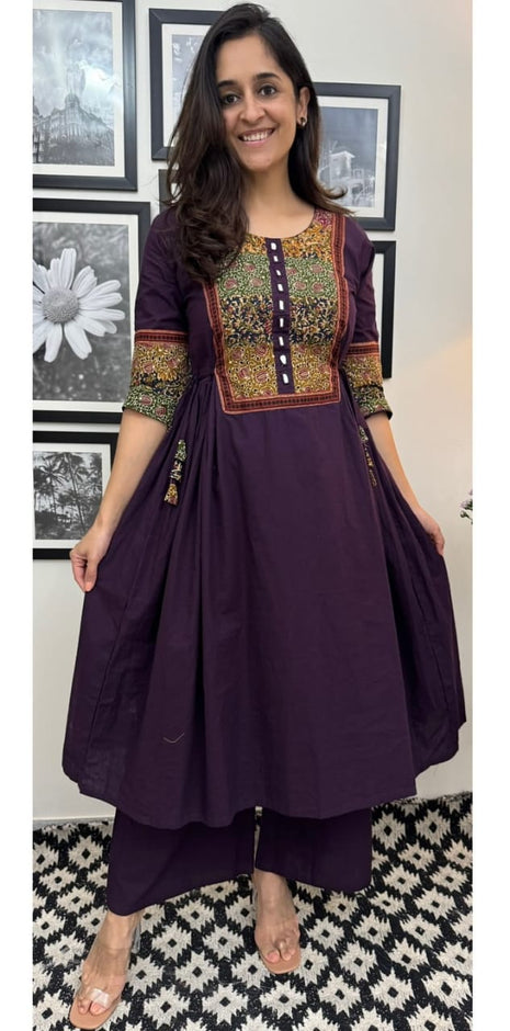 Festive cotton kurta set with tassels and mirror embroidery work