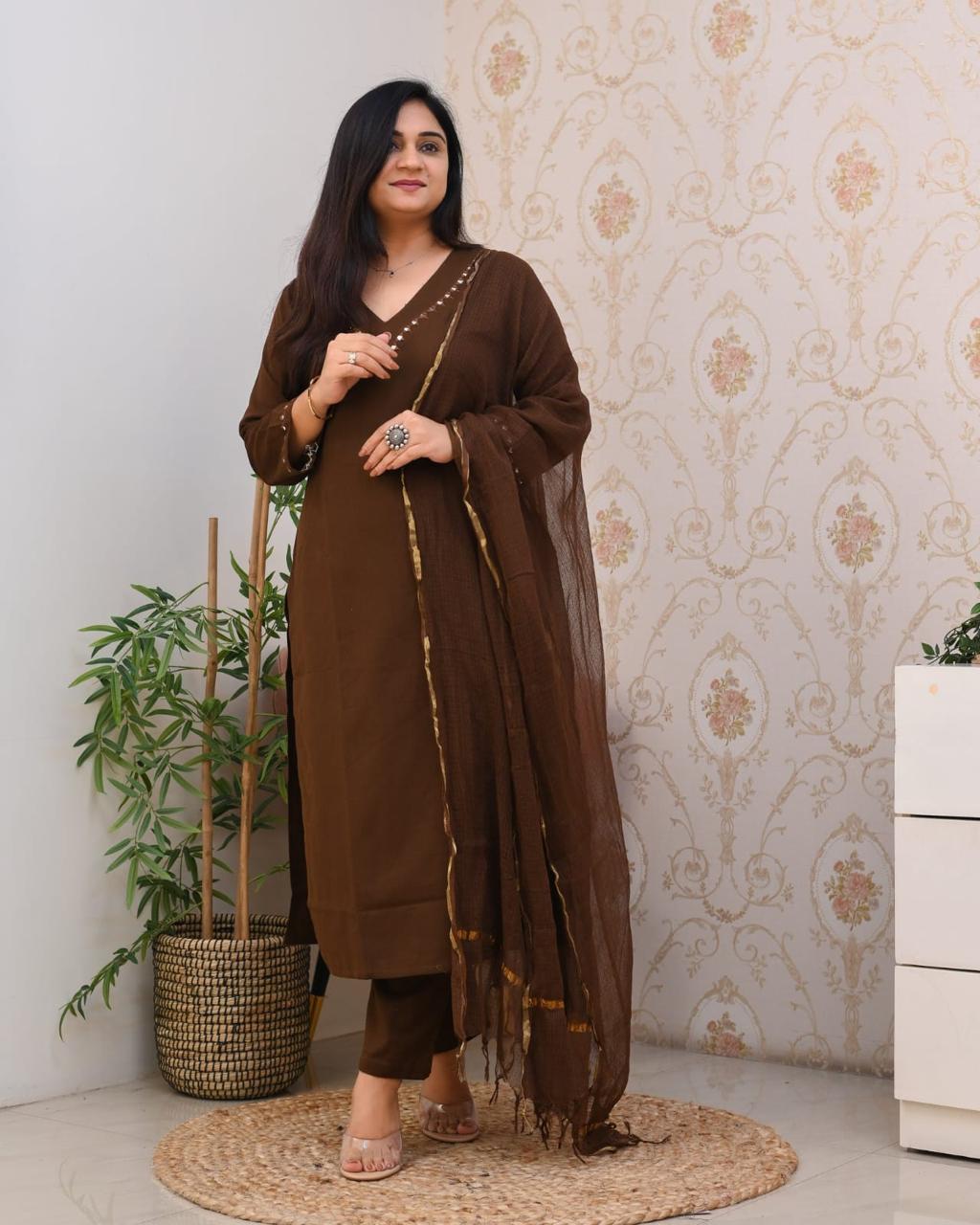 Zari Kota Doria dupatta paired with embroidered mirror work kurta set