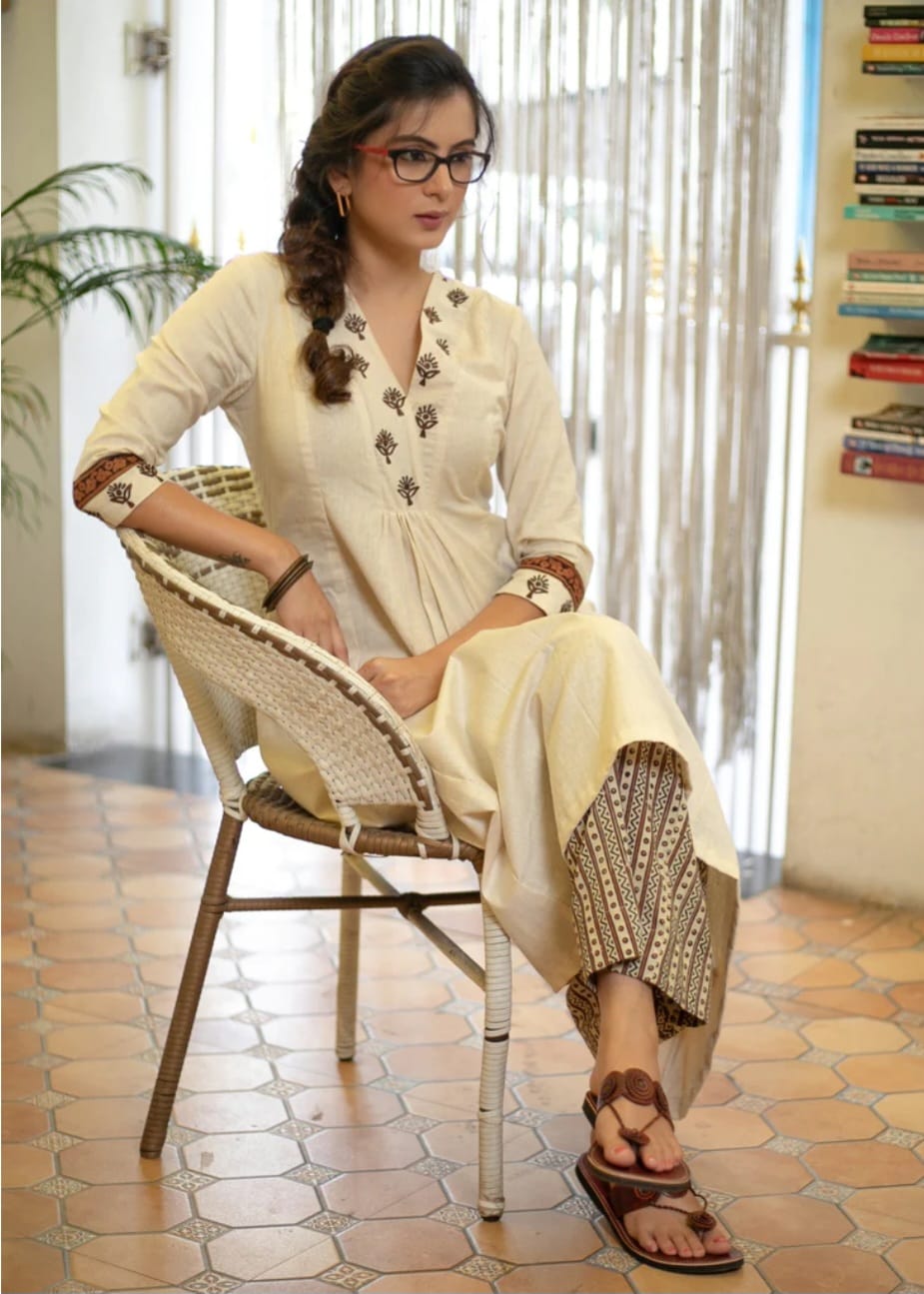 Rayon A-line kurta set with embroidered side borders

