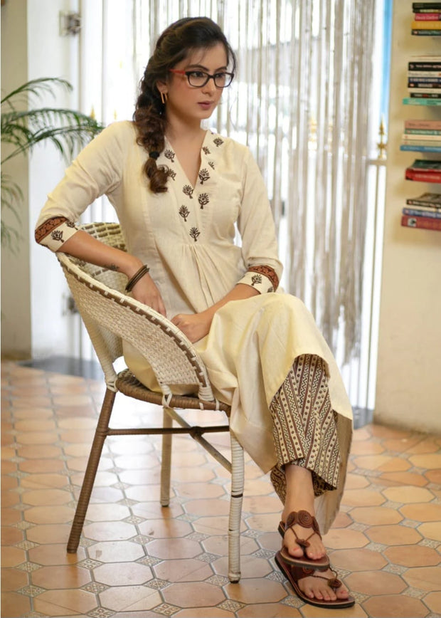 Rayon A-line kurta set with embroidered side borders

