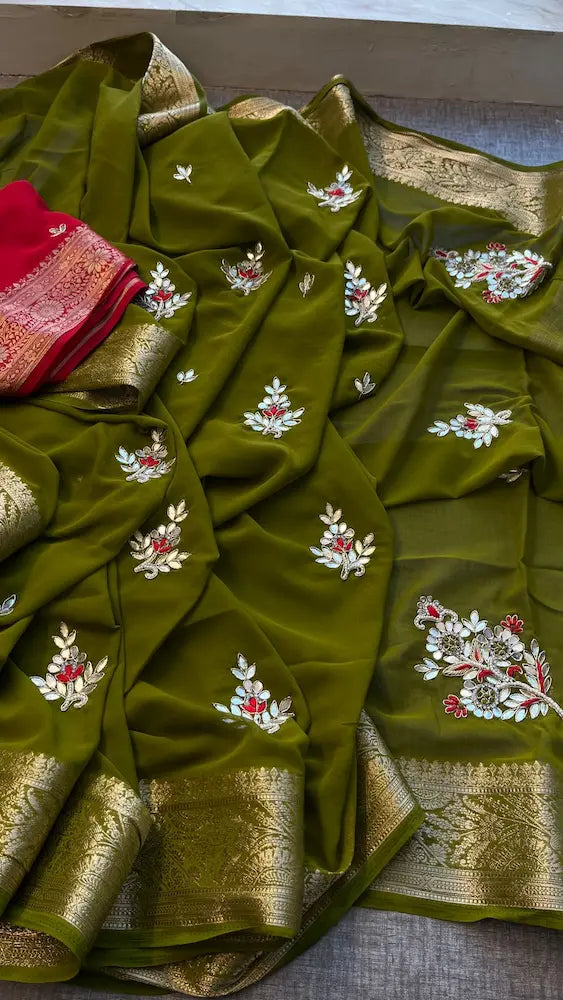 Pure georgette nano zari handwork saree with contrast blouse in green