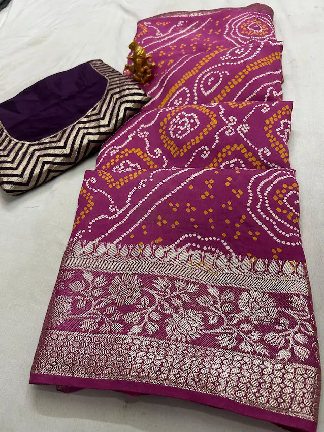 Close-up of bandhej print on glossy silk fabric