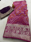 Close-up of bandhej print on glossy silk fabric