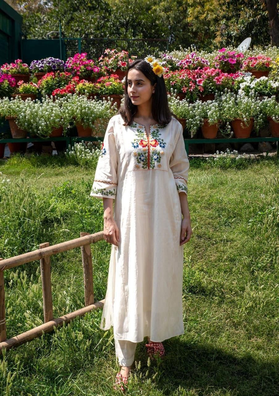 Kalidar kurta set with colourful threadwork


