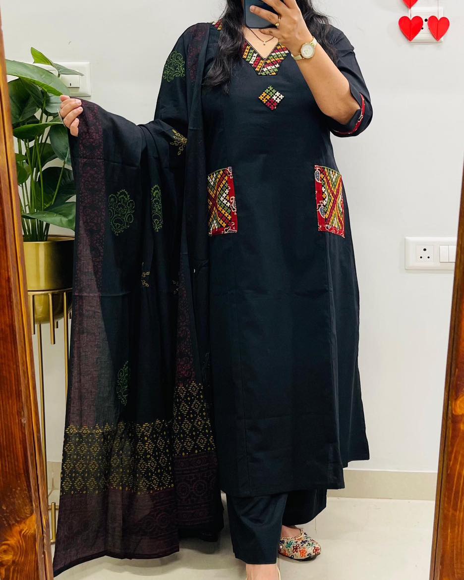 Women’s embroidered cotton kurti set with side pockets and slit design