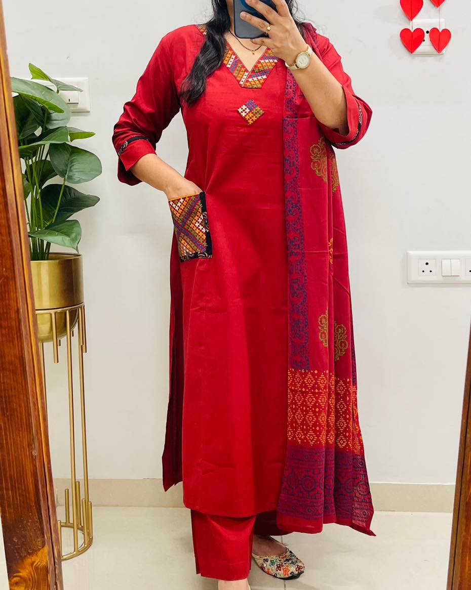 V-neck cotton kurti set with heavy embroidery on pockets and yoke