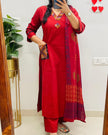 V-neck cotton kurti set with heavy embroidery on pockets and yoke