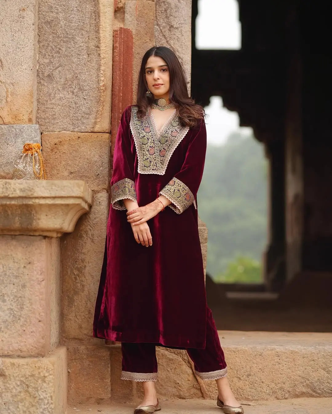 Maroon velvet suit set with heavy thread and lace work
