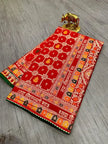 Close-up of zari weaving on pure dola silk fabric