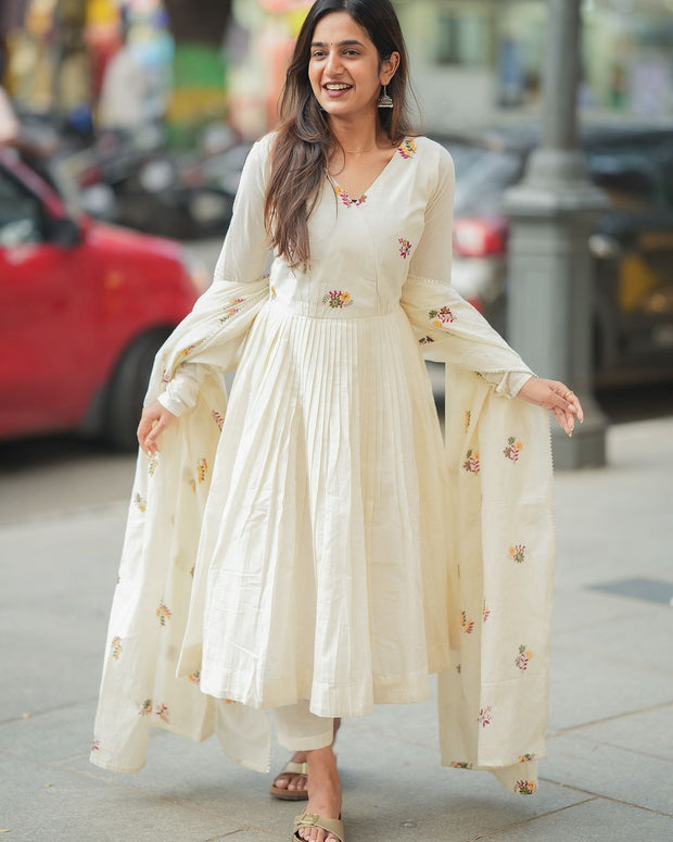 White cotton suit set with hand work and mulmul dupatta

