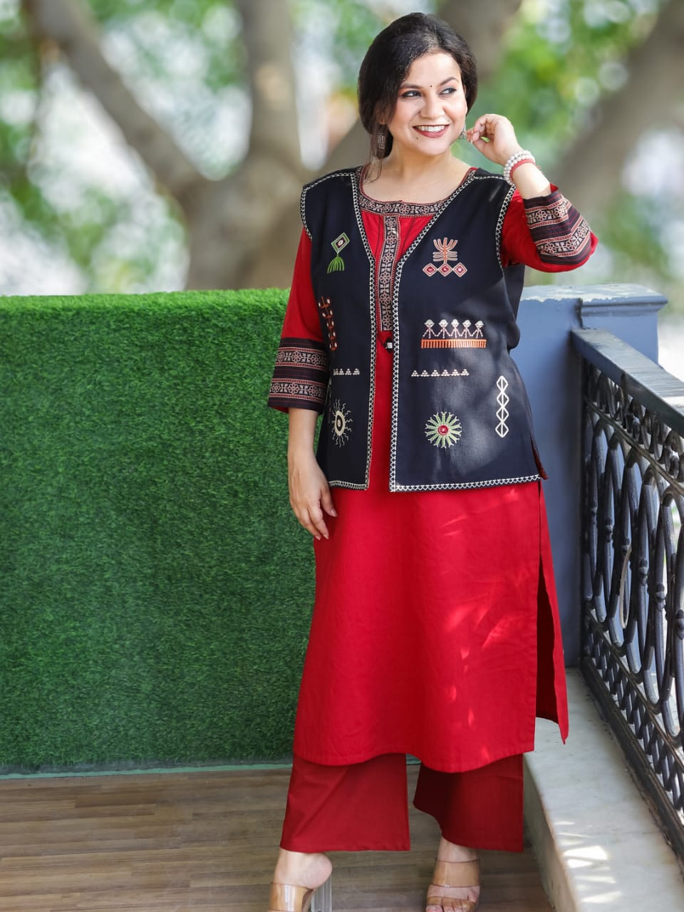 Winter wedding kurti pant set with embroidered jacket in red colour