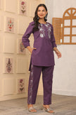 Model in embroidered cotton coord set – front view

