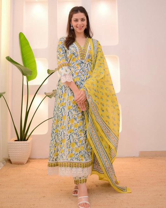Yellow cotton Afghani suit with floral schiffli work