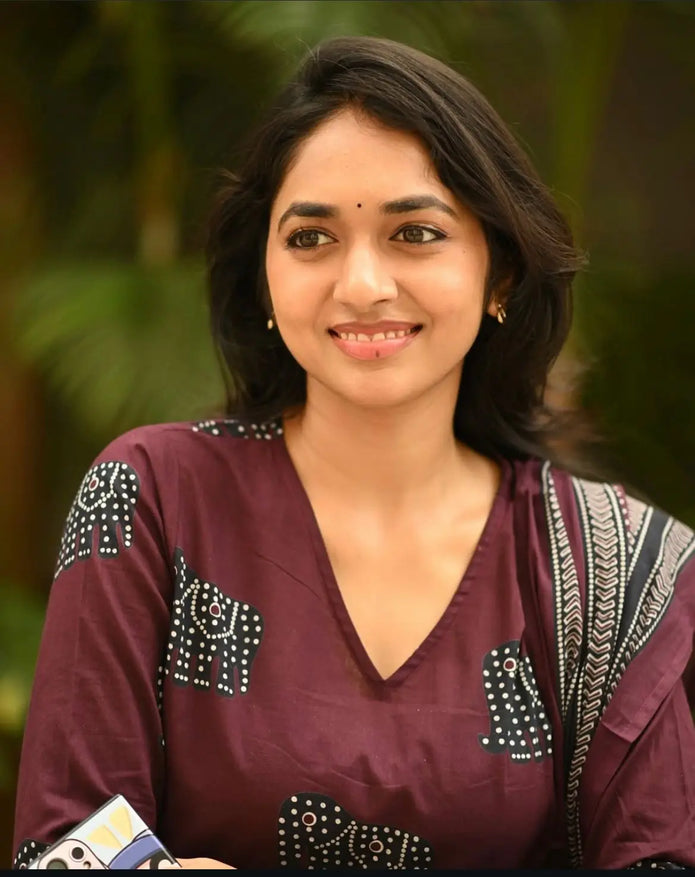 Close-up of festive embroidery on cotton kurti

