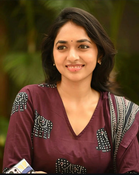 Close-up of festive embroidery on cotton kurti

