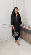 Front view of embroidered cotton kurti and pant set


