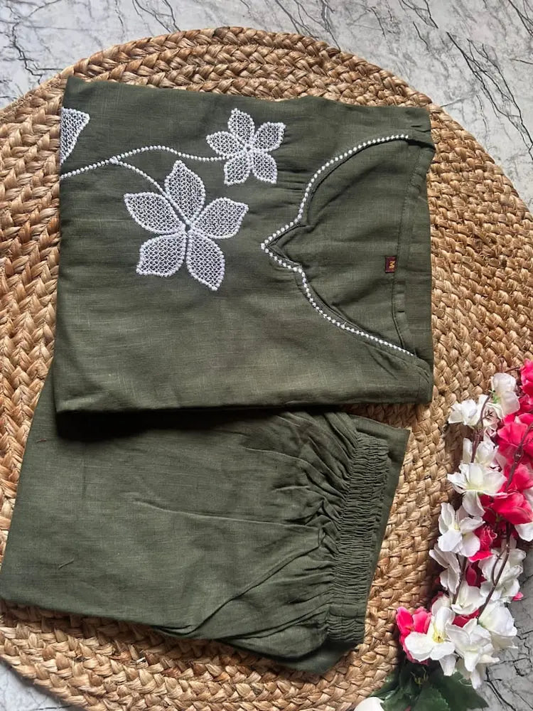 Close-up  embroidery on white khadi kurta


