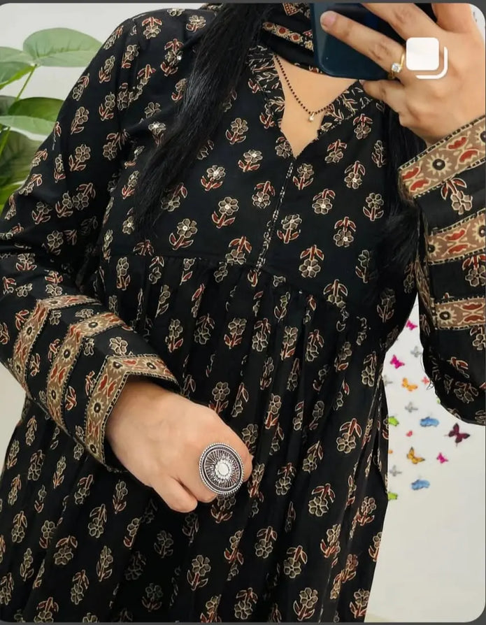 Three-piece cotton suit set with kurti, pant, and dupatta

